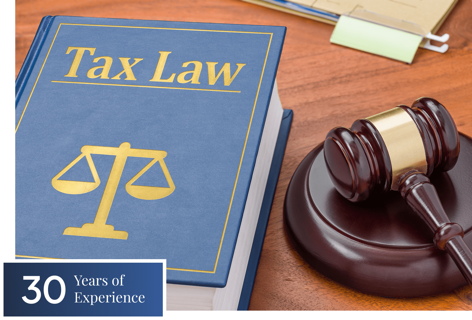 Tax law book and gavel on table